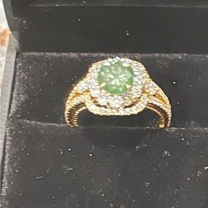 2.30 cts 18k yellow and white gold halo ring. Size 6.5  and is resizeabl…